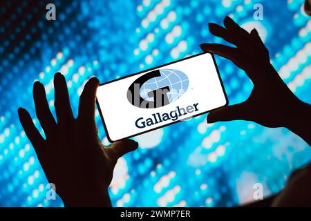 In dieser Fotoabbildung wird das Arthur J. Gallagher (AJG) Logo auf einem Smartphone-Bildschirm angezeigt. (Foto von Rafael Henrique / SOPA Images/SIPA USA) *** ausschließlich für redaktionelle Nachrichtenzwecke *** Stockfoto