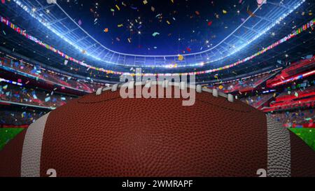 American Football. Konfetti wird von oben geworfen. Das Stadion ist voller Zuschauer, die vor Spannung warten. Stockfoto
