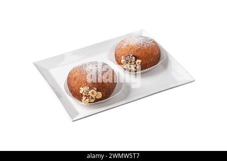 Bombolon oder Bomboloni ist ein italienisches gefülltes Donut- und Snackfutter. Deutsche Krapfen - Krapfen oder berliner - gefüllt mit Marmelade und Schokolade Stockfoto