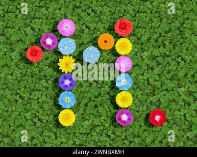 Nummer geschrieben mit bunten Blumen auf grünem Kleeblatt Hintergrund Stockfoto