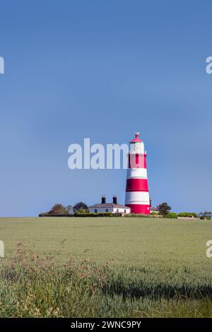 Blick auf den Leuchtturm von Happisburgh an einem Frühlingsnachmittag, North Norfolk, England Stockfoto