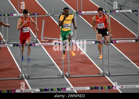 David King (GB), Wilhem Belocian (frankreich), Asier Martinez (Spanien) und Damion Thomas (Jamaika) treten an den 60-m-Hürden der Männer bei der Leichtathletik-Weltmeisterschaft in Glasgow am 2. März 2024 an Stockfoto