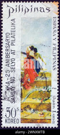PHILIPPINEN - UM 1972: Ein auf Philippinen gedruckter Stempel zeigt das Gemälde „Espana y Filipinas“ (Juan Luna) Stockfoto