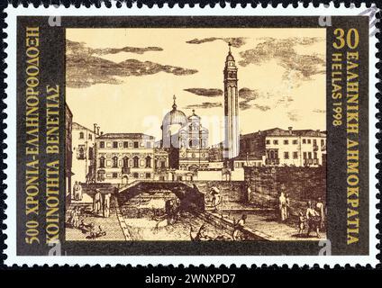 GRIECHENLAND - UM 1998: Ein in Griechenland gedruckter Stempel zeigt die griechisch-orthodoxe Kathedrale San Giorgio dei Greci in Venedig. Stockfoto