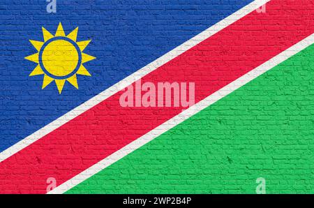 Namibia Flaggenfarben auf einer Ziegelwand gemalt. Namibia Flaggenfarben auf einer Ziegelwand gemalt. Nationalfarben, Land, Banner, Regierung, namibische Kultur, Politik. Country FLAG Brick Wall namibia Stockfoto