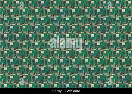 Regelmäßig als Hintergrund angeordnete Computerplatinen. Stockfoto