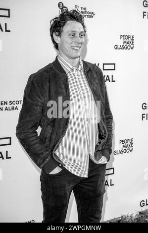 Glasgow, Schottland, Großbritannien. März 2024. Schauspieler, George MacKay, auf dem roten Teppich bei einem Fotoanruf für eine ausverkaufte Vorführung von The Beast im Glasgow Stockfoto