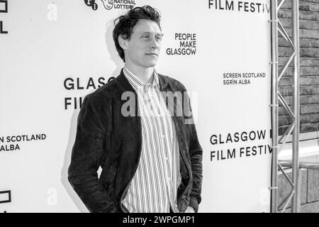 Glasgow, Schottland, Großbritannien. März 2024. Schauspieler, George MacKay, auf dem roten Teppich bei einem Fotoanruf für eine ausverkaufte Vorführung von The Beast im Glasgow Stockfoto