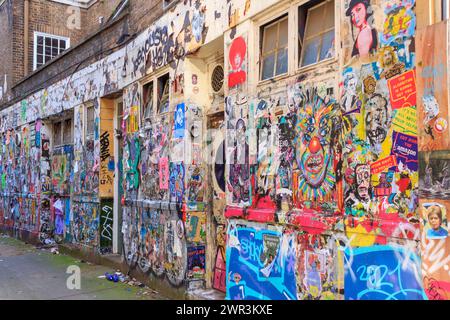 Graffiti an einer Wand in der Brick Lane in London Stockfoto