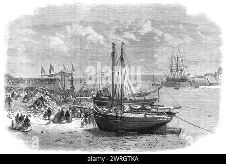 Grundstein für das Hubberston Dock in Milford Haven, 1864. "Der Grundstein... wurde am Donnerstag, dem 11. August, von Mrs. Potter gelegt, der Frau von Mr. Richard Potter, dem Vorsitzenden der Great Western Railway Company. Dieses Ereignis wurde als eine von großer Bedeutung für die Interessen der Grafschaft Pembroke angesehen. die sich einige Tage zuvor auch zur Eröffnung der kurzen Bahnstrecke von Pembroke nach Pembroke Docks beglückwünschte, mit der Aussicht auf eine zügige Fertigstellung der Pembroke und Tenby Strecke. Der Ort, der für den Standort des neuen Docks i gewählt wurde Stockfoto