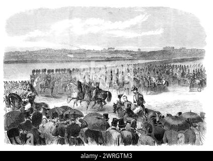 Bericht im Champ de Mars in Paris zu Ehren des Königs von Spanien, 1864. "...das große militärische Spektakel... wurde von einer riesigen Zuschauermenge gesehen... leider waren rain...came Soldaten schwer niedergeschlagen... die Truppen am Boden bestanden aus 51 Bataillonen der Nationalgarde, 21 der Kaiserlichen Garde, 37 der Linie, sechsunddreißig Kavallerie-Geschwader, 18 Artilleriebatterien, 108 Kanonen, die Schüler der Schule St. Cyr, eine Gruppe des Waggonzuges und Pontoner der Garde, die zusammen eine effektive Kraft von etwa 70.000 Mann bilden. Die Nationalgarde Stockfoto