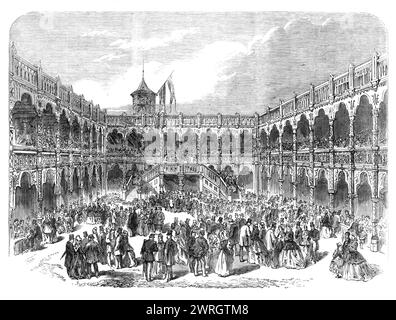 Großes Festival der Gemeinde und Königlichen Akademie Antwerpen: Vorübergehende Restaurierung der alten Börse während der Messe, 1864. „Die wichtigste aller Zeremonien, Shows und Unterhaltungsveranstaltungen... war eine Messe „nach dem Vorbild des 16. Und 17. Jahrhunderts“, die inmitten der Ruinen der alten Antwerpener Börse stattfand, die vor einigen Jahren durch Feuer zerstört wurde. Die wichtigsten architektonischen Merkmale dieses Gebäudes wurden vorläufig von M. Looymans restauriert, um die Wirkung seines Innenraums zu reproduzieren, wenn er von den Ständen der Handwerker besetzt wurde, mit einer Menge von Käufern oder spe Stockfoto