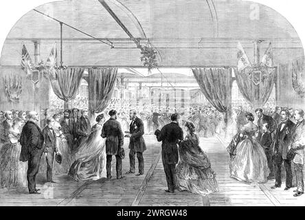 Festival in Hartford Mill, Oldham, gegeben von Mr. Platt an 8000 seiner Arbeiter, 1864. "Zur Feier der Erlangung seiner Mehrheit durch Mr. Henry Platt, Sohn von Mr. John Platt... wurden die Arbeiter der Hartford Works, Oldham, die zu Messrs. Platt, Brothers und Co. Gehörten, von den Hauptmitgliedern der Firma unterhalten... der Tee begann um fünf Uhr. und die Kompanie, als sie ankamen, wurde an ihre Plätze gebracht. Sie waren in vier Relais unterteilt, von denen etwa 2000 gleichzeitig versorgt wurden. Als die Zimmer voll waren, war die Szene sehr animiert. Es kann eine Idee des entstehen Stockfoto