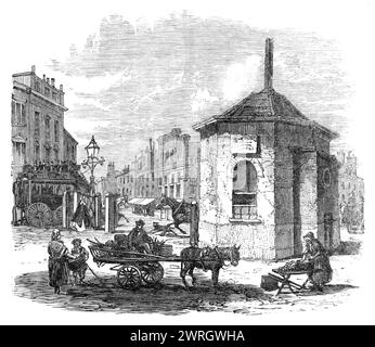 Turnpike-Tore in und in der Nähe von London wurden gerade abgerissen: Islington Gate, 1864. "Diese Woche wurde Zeuge der Abschaffung der Mautbeschränkungen auf 50 Meilen Straße in und um London auf der Middlesex-Seite der Themse. Vor vielen Jahren begann die Agitation für ihre Absetzung, und die Illustrated London News haben dann die Vorreiterrolle übernommen, um diese wichtige Frage der sozialen und wirtschaftlichen Reform zu befürworten. Wir haben daher gedacht, dass es sich lohnt, Skizzen einiger der Zolltore zu gravieren, die jedem Londoner Auge so vertraut waren und die teilweise in der L.A. verschwunden sind Stockfoto