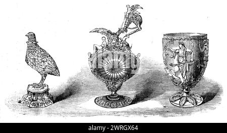 The Loan Collection, South-Kensington, 1862. Becher, in Form eines Rebhuhns; der Körper besteht aus sich überlagernden Perlmuttstücken in Imitation von Federn... um 1600. Baron L. de Rothschild. "Die Cellini Ewer."...auf jeder Seite des Sardonyx-Zentrums stehen weibliche Köpfe... gegenüber stehen Kopf und Körper eines Mannes, der in zwei Drachenschwänzen endet. auf dem Kopf dieser letzten Figur steht eine Art Kakatrice oder Monster... zwischen den Flügeln sitzt ein Cupid... der Hals der Vase ist ebenfalls mit Rubinen besetzt... italienische Werke des 16. Jahrhunderts. Dieser prächtige Ewer war Teil des Cro Stockfoto