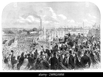 Eröffnung des People's Park, Farnworth, in der Nähe von Bolton, Lancashire, 1864. Der Finanzminister und der zukünftige Premierminister William Ewart Gladstone sprach vor der Menge. Auf den Bannern stand: „Das Vergnügen des Werktätigen; der reiche &amp; Arm [?]; Willkommen Gladstone; Gesundheit für den Spender; Genuss des Volkes“. Farnworth Park wurde den Menschen von Farnworth gegeben, um eine willkommene Erholung von den täglichen Trümmern der Mühlen oder Minen zu bieten. Aus Illustrated London News, 1864. Stockfoto