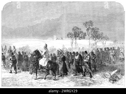 Der Krieg in Schleswig: Dänische Gefangene auf dem Weg nach Rendsburg nach der Schlacht bei Over-Selk - nach einer Skizze unseres Sonderkünstlers, 1864. "Der dänische Verlust kann nicht genau ausgewiesen werden. Viele Tote und Verwundete wurden auf dem Feld zurückgelassen, etwa 100 Gefangene wurden eingeliefert. und eine Waffe wurde im Vormarsch vom 18. Jager-Bataillon gefangen genommen... das Land zwischen Breckendorf und Over-Selk war von der trostlosesten und unwirtlichsten Beschreibung... Hecken es gab keine, da die Dänen das niedergeschlagen hatten, was es vorher gab, um sich zurückzuziehen. Die Dörfer und Bauernhäuser sind nur wenige in der Zahl und in der Zahl Stockfoto