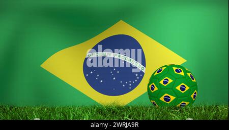 Bild: Die brasilianische Flagge über den Fußballball schwenken Stockfoto