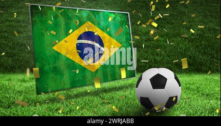 Bild der Flagge brasiliens und des Fußballs über dem Stadion Stockfoto