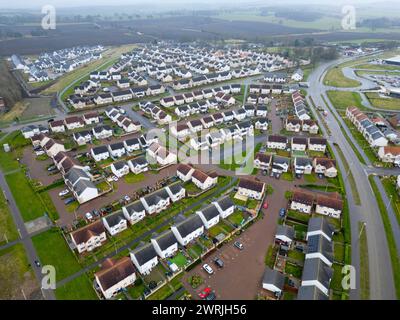 Neubauten in einem neuen Wohngebiet in Winchburgh, West Lothian, Schottland, Großbritannien Stockfoto