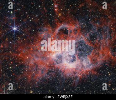 WELTRAUM NGC 604 – 26. Februar 2024 – dieses Bild von NIRCam (Near-Infrared Camera) des James Webb Space Telescope der NASA zeigt die Sternentstehungsregion NGC Stockfoto