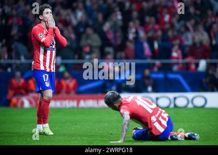 Madrid, Spanien. März 2024. Rodrigo Riquelme (L) von Atletico Madrid reagiert beim Achtelfinale der UEFA Champions League am 13. März 2024 im zweiten Legspiel zwischen Atletico Madrid und Inter Mailand in Madrid. Gustavo Valiente/Xinhua/Alamy Live News Stockfoto