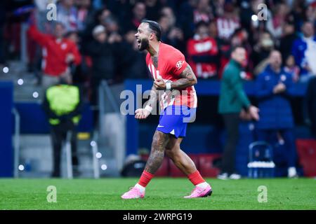 Madrid, Spanien. März 2024. Memphis Depay von Atletico Madrid feiert im Achtelfinale der UEFA Champions League am 13. März 2024 in Madrid ein Tor. Gustavo Valiente/Xinhua/Alamy Live News Stockfoto
