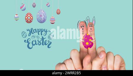 Bild von Happy easter, Eier und Finger malen als Häschen auf minzwertigem Hintergrund Stockfoto