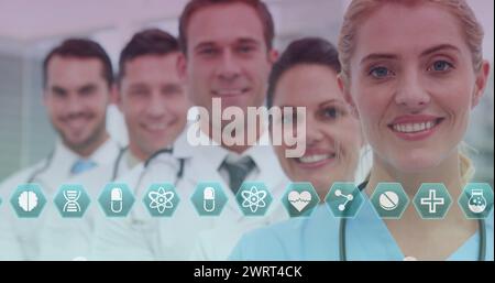 Bild der kaukasischen Ärzte über medizinische Ikonen Stockfoto
