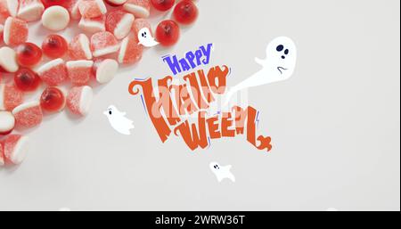 Happy halloween Text Banner und Geister Symbole gegen Nahaufnahme von Süßigkeiten Hühneraugen auf weißer Oberfläche Stockfoto