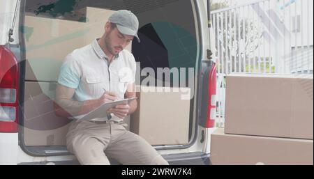 Bild von Statistiken und Verarbeitung von Finanzdaten über Liefermann und Lieferwagen Stockfoto