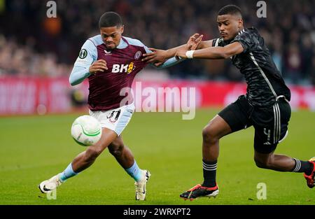 Birmingham, Großbritannien. März 2024. Leon Bailey aus Aston Villa (L) wird von Jorrel Hato aus Ajax im Achtelfinale der UEFA Europa Conference League in Villa Park, Birmingham, herausgefordert. Der Bildnachweis sollte lauten: Andrew Yates/Sportimage Credit: Sportimage Ltd/Alamy Live News Stockfoto