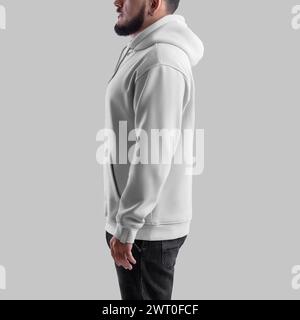 Übergroße weiße Hoodie-Vorlage auf bärtigem Mann, Seitenansicht, Textilbekleidung mit Tasche, Schnürsenkel, Label für Design. Mockup eines stylischen männlichen Sweatshirts. Stockfoto