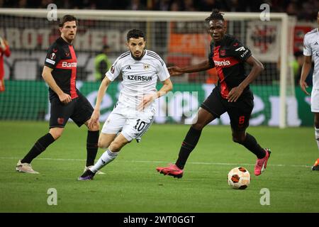 Leverkusen, Deutschland. März 2024. Jonas Hofmann (Bayer), Abdellah Zoubir (Qarabag), Odilon Kossounou (Bayer), UEFA Europa League, Gruppenphase, Achtelfinale, Rueckspiel, Bayer 04 Leverkusen vs Qarabag Agdam, Leverkusen, Deutschland, 14.03.2024. Quelle: Jürgen Schwarz/Alamy Live News Stockfoto