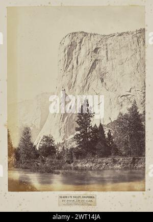 Yo-SEM-i-te Valley, Kalifornien. Tu-toch-Ah-nu-lah (großer Häuptling des Tals). Der Captain, 3.500 Meter über dem Tal. Eadweard J. Muybridge, Fotograf (Amerikaner, geboren 1830–1904) negative 1867, später View of El Capitan, in der Ahwahnechee-Sprache auch „to-tock-Ah-noo-lah“ genannt, im Yosemite-Nationalpark. Ein Fluss ist im Vordergrund zu sehen. (Recto, Mount) Mitte links, neben dem Bild, Bleistift: '#4011 / Howell copy'; unten links, Bleistift: 'P14 III Hittell / B&R 4004 / Bancroft 9'; unten links, unter dem Bild, gedruckt auf Etikett, in schwarzer Tinte: 'YO-SEM-i-TE VALLEY, CA. Stockfoto