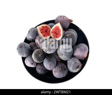 Violette Feigen vor weißem Hintergrund Stockfoto