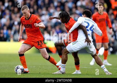 Georginio Rutter (rechts) von Leeds United kämpft um den Ball mit George Saville (links) von Millwall und Michael Obafemi während des Sky Bet Championship Matches in der Elland Road, Leeds. Bilddatum: Sonntag, 17. März 2024. Stockfoto