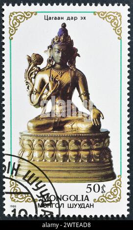 Von der Mongolei gedruckte gestempelte Briefmarke mit buddhistischer Statue, ca. 1989. Stockfoto