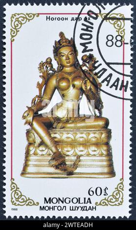 Von der Mongolei gedruckte gestempelte Briefmarke mit buddhistischer Statue, ca. 1989. Stockfoto