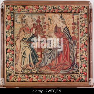 Geburt Christi: Heilige Familie Trinitas terrestris. Unbekannt ca. 1500-1525 Gobelin Abmessungen: H 3'9' x B 4' Gobelin Materialien/Techniken: Wolle; Seide; Metallfäden (Gold); Metallfäden (Silber) Kultur: Southern Netherlands Weaving Center: Unbekanntes Eigentum Geschichte: French & Co. Gekauft von Arnold Seligmann, Rey & Co., Inc., 1/2/1920; verkauft an S. W. Straus 12/29/1925 [SS 21816]. French & Co. Gekauft von Frau S. W. Straus [durchgestrichen und ersetzt durch: L. S. Celestin] 1947; zurückgesandt/wiederversandt 18/1961 [SS 78850]. In der Landschaft, St.. Joseph kniete vor dem Sitzen Madonna (Jungfrau M. Stockfoto