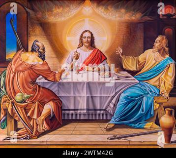MAILAND, ITALIEN - 8. MÄRZ 2024: Das Gemälde der Szene Jesus und die Jünger von Emausy in der Kirche Chiesa di Santi Quattro Evangelisti Stockfoto