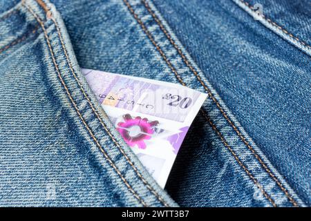 Die Royal Bank of Scotland verfügt über 20 £ Schottische Banknoten in einer Jeanstasche hinten Stockfoto