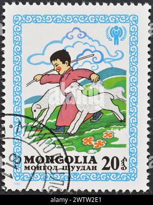 Von der Mongolei gedruckte Briefmarke, die Kinder zeigt, Internationales Jahr des Kindes, um 1980. Stockfoto