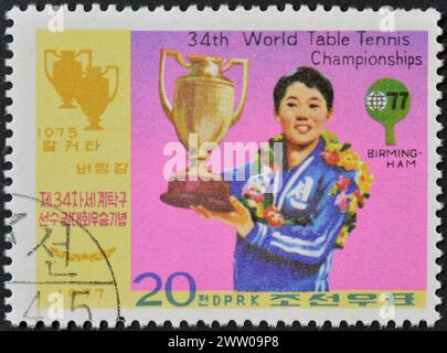 Von Nordkorea gedruckte Briefmarke, die die 3. Asiatische Tischtennis-Meisterschaft um 1977 fördert. Stockfoto