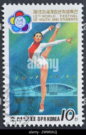 Gestempelte Briefmarke von Nordkorea, die Gymnast, 13. Weltfestival der Jugend und Studenten, Pjöngjang, um 1988 zeigt. Stockfoto