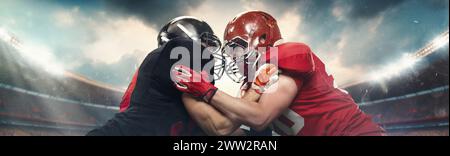 Zwei American Football-Spieler in Helmen, die sich mit intensivem Ausdruck gegenüberstehen, stehen im Stadion mit Scheinwerfern gegenüber. Stockfoto