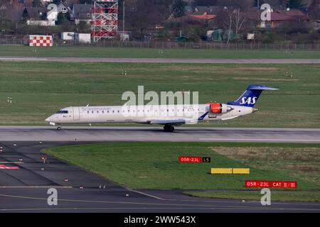 EI-FPN SAS Scandinavian Airlines Bombardier CRJ-900LR, Opby CityJet am Flughafen Düsseldorf. DUS EDDL. Düsseldorf, Nordrhein-Westfalen, DEU, Deutschland, 14.03.2024 *** EI FPN SAS Scandinavian Airlines Bombardier CRJ 900LR, Opby CityJet am Flughafen Düsseldorf DUS EDDL Düsseldorf, Nordrhein-Westfalen, DEU, Deutschland, 14 03 2024 Stockfoto