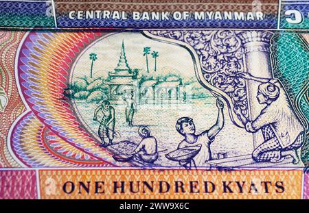 Tempelrenovierungsszene auf Myanmar 100-Kyat-Banknote (Schwerpunkt auf Zentrum) Stockfoto