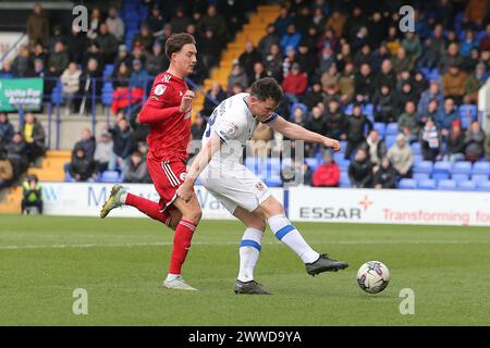 Birkenhead, Großbritannien. März 2024. Connor Jennings von den Tranmere Rovers versucht einen Schuss. EFL Skybet Football League Two Match, Tranmere Rovers gegen Crawley Town im Prenton Park, Birkenhead, Wirral am Samstag, 23. März 2024. Dieses Bild darf nur für redaktionelle Zwecke verwendet werden. Nur redaktionelle Verwendung, .PIC von Chris Stading/ Credit: Andrew Orchard Sportfotografie/Alamy Live News Stockfoto