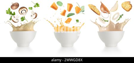Set cremige Suppen spritzen. Champignon, Kürbis und Zwiebeln fallen in Suppenschalen, die auf weißem Hintergrund plätschern. Stockfoto